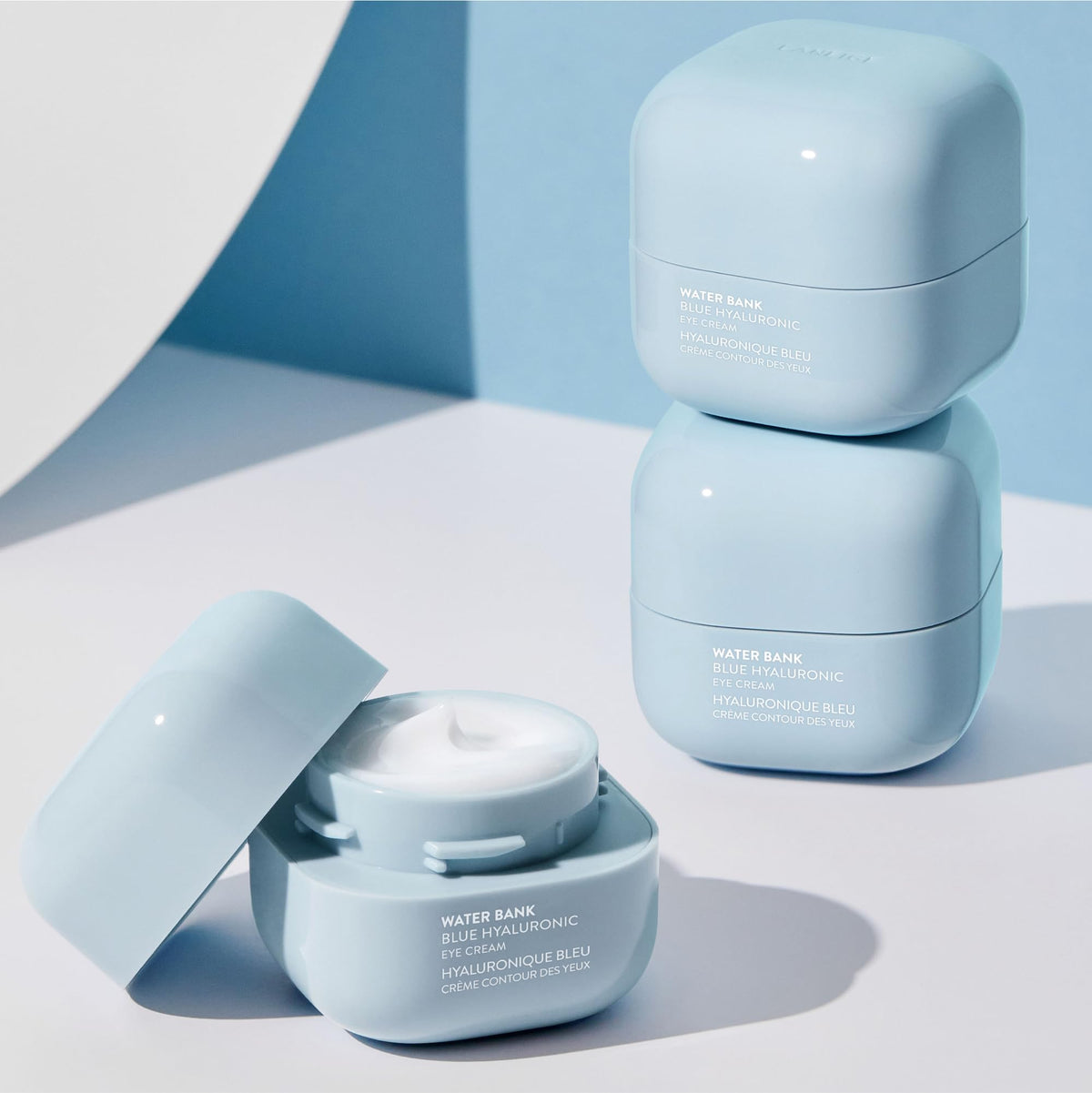 LANEIGE size comparison next to coin showing compact travel-friendly size