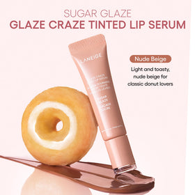 LANEIGE serum droplet on fingertip showing concentrated skincare-rich formulation