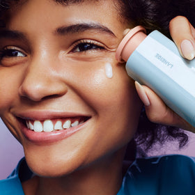 LANEIGE serum on bathroom counter lifestyle image suggesting daily routine boost
