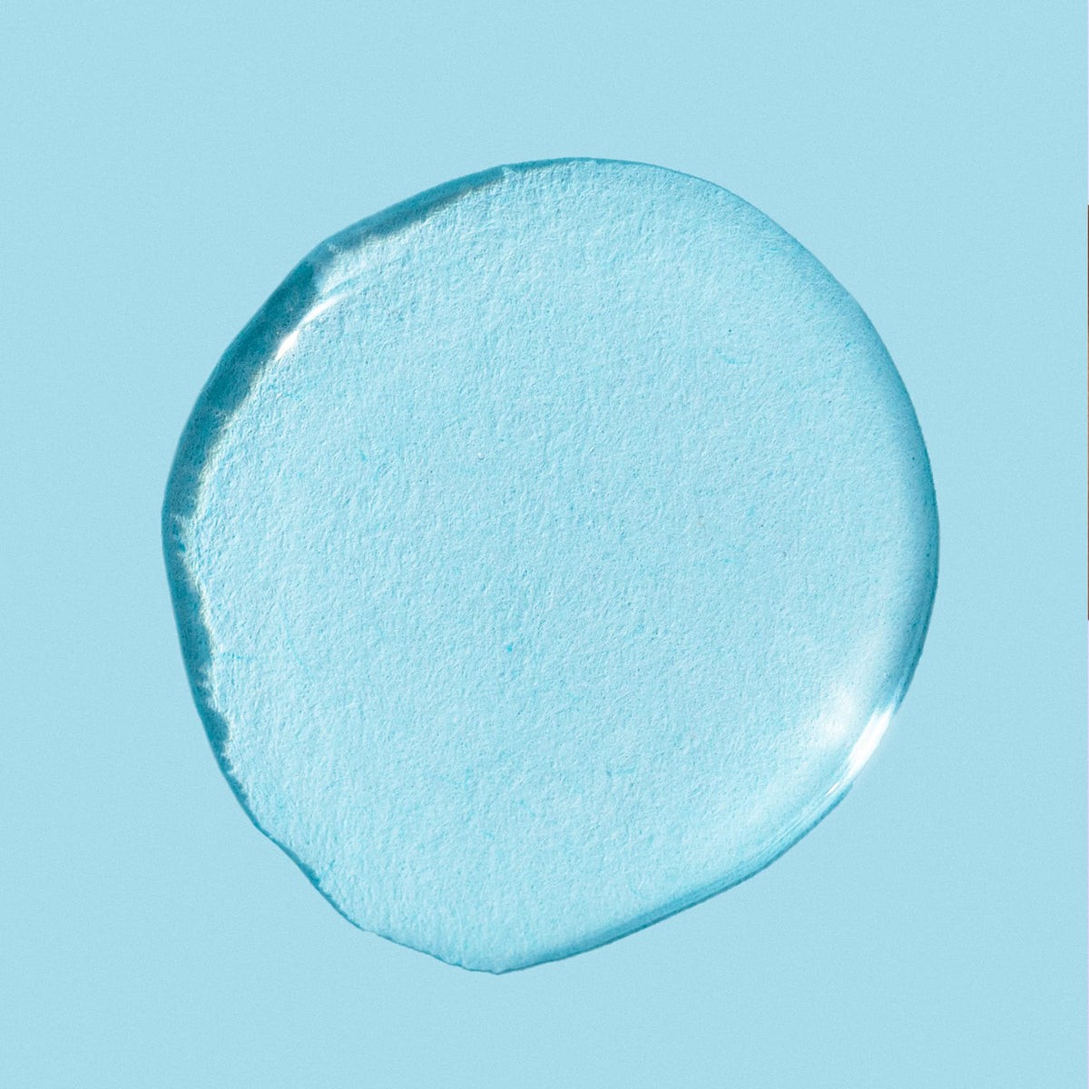 LANEIGE toner on cotton pad demonstrating gentle application benefit