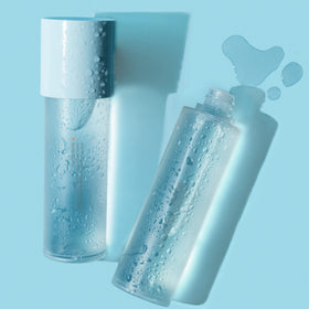 hand holding LANEIGE toner for size reference and travel-friendly benefit