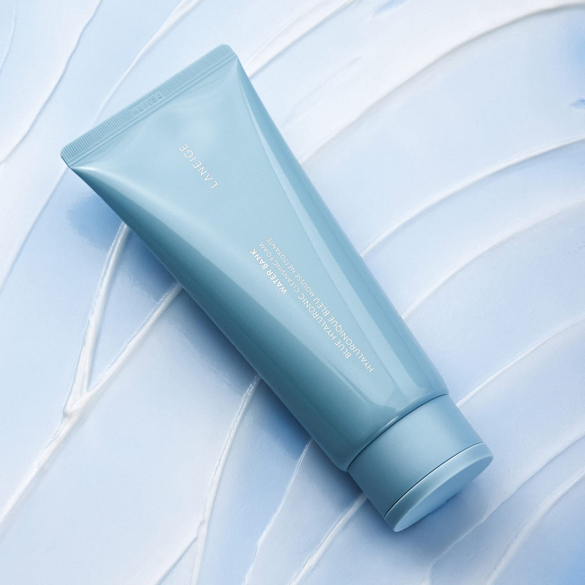 LANEIGE foam dispensed from pump showing soft, airy texture and gentle cleanse
