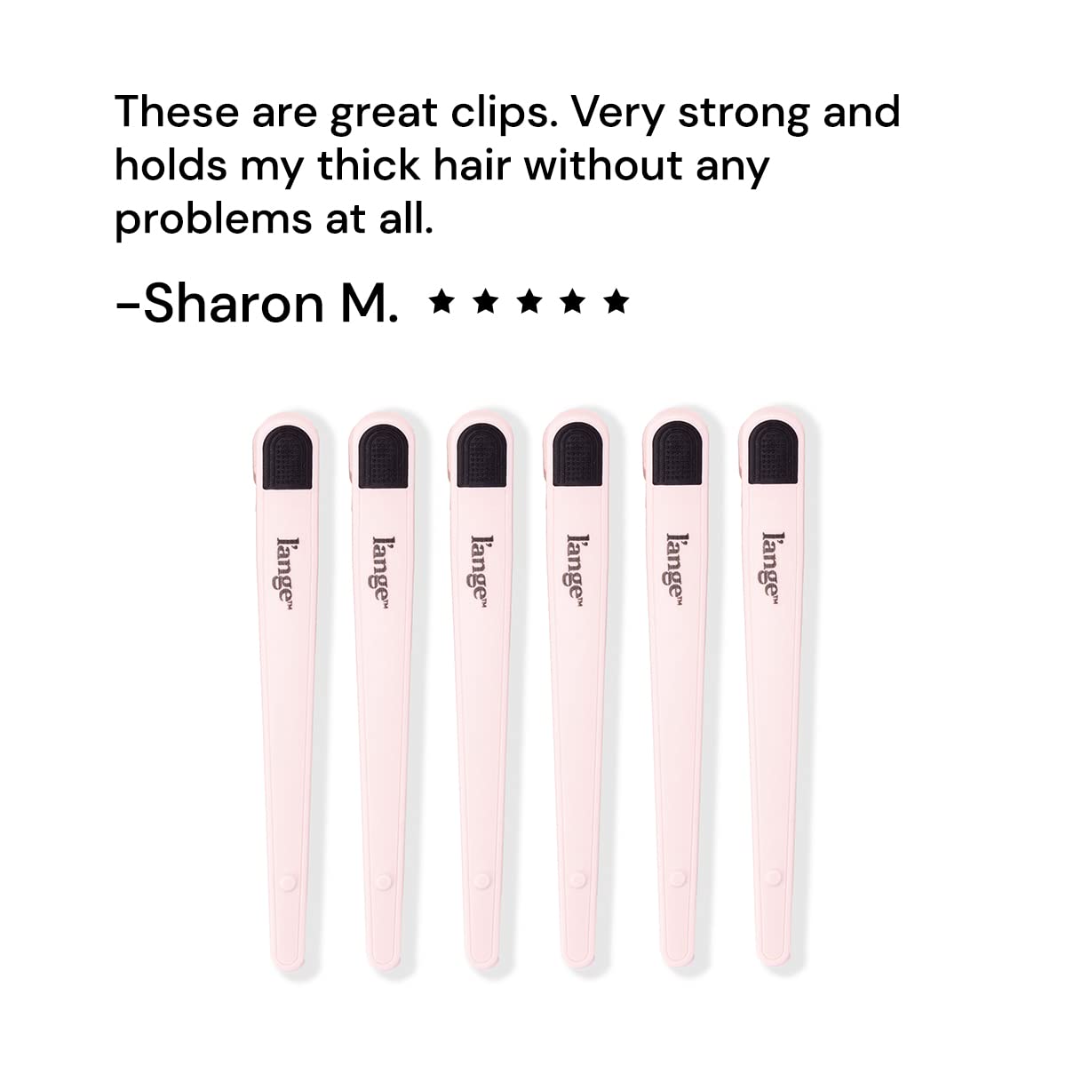 L'ANGE HAIR clips holding hair sections in a salon, boosting styling efficiency
