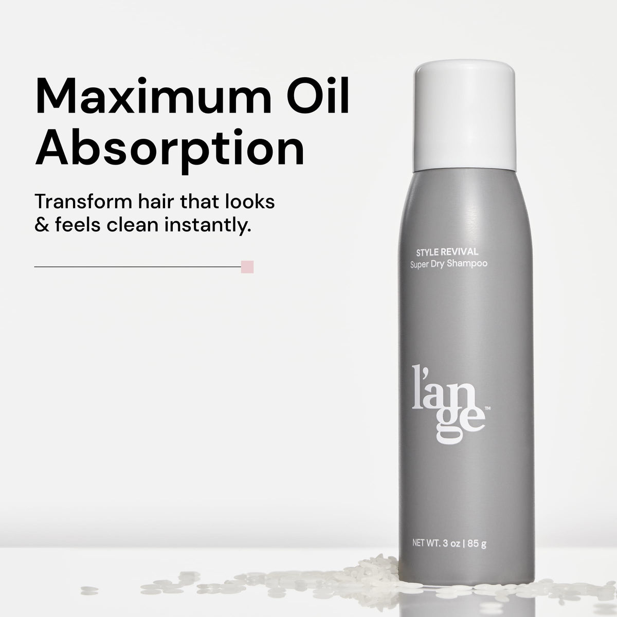 L'ANGE HAIR close-up of spray nozzle releasing fine mist — precise application and even coverage
