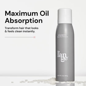 L'ANGE HAIR close-up of spray nozzle releasing fine mist — precise application and even coverage