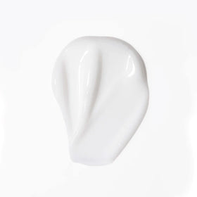 L'ANGE HAIR cream being scrunched into curly hair showing defined, frizz-reduced curls