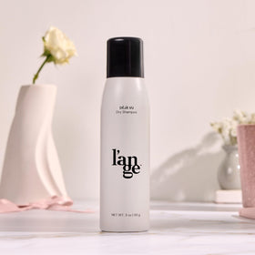 L'ANGE HAIR can beside travel items showing portable size convenience