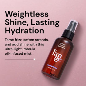 L'ANGE HAIR fine mist spray in action delivering even coverage and frizz control