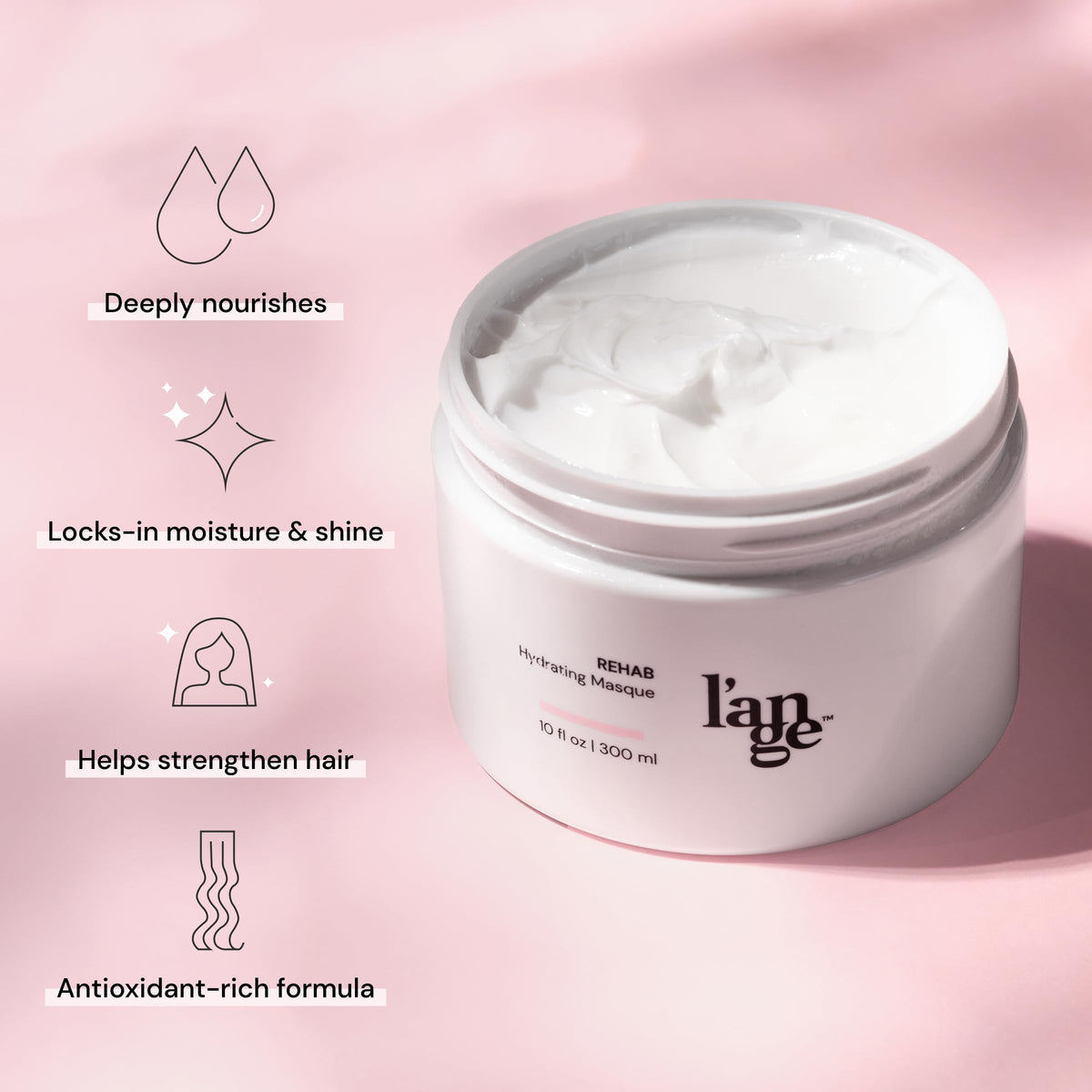 L'ANGE HAIR masque being applied to hair conveying intense hydration benefit