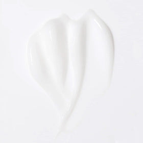 L'ANGE HAIR bottle held for scale showing travel-friendly curl care benefit