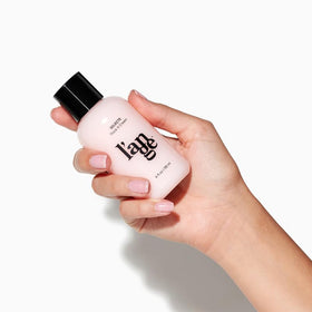 L'ANGE HAIR jar next to ruler for 4 fl oz scale and easy sizing comparison benefit