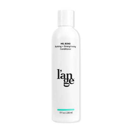 L'ANGE HAIR front bottle shot showing compact 8 fl oz packaging and professional design