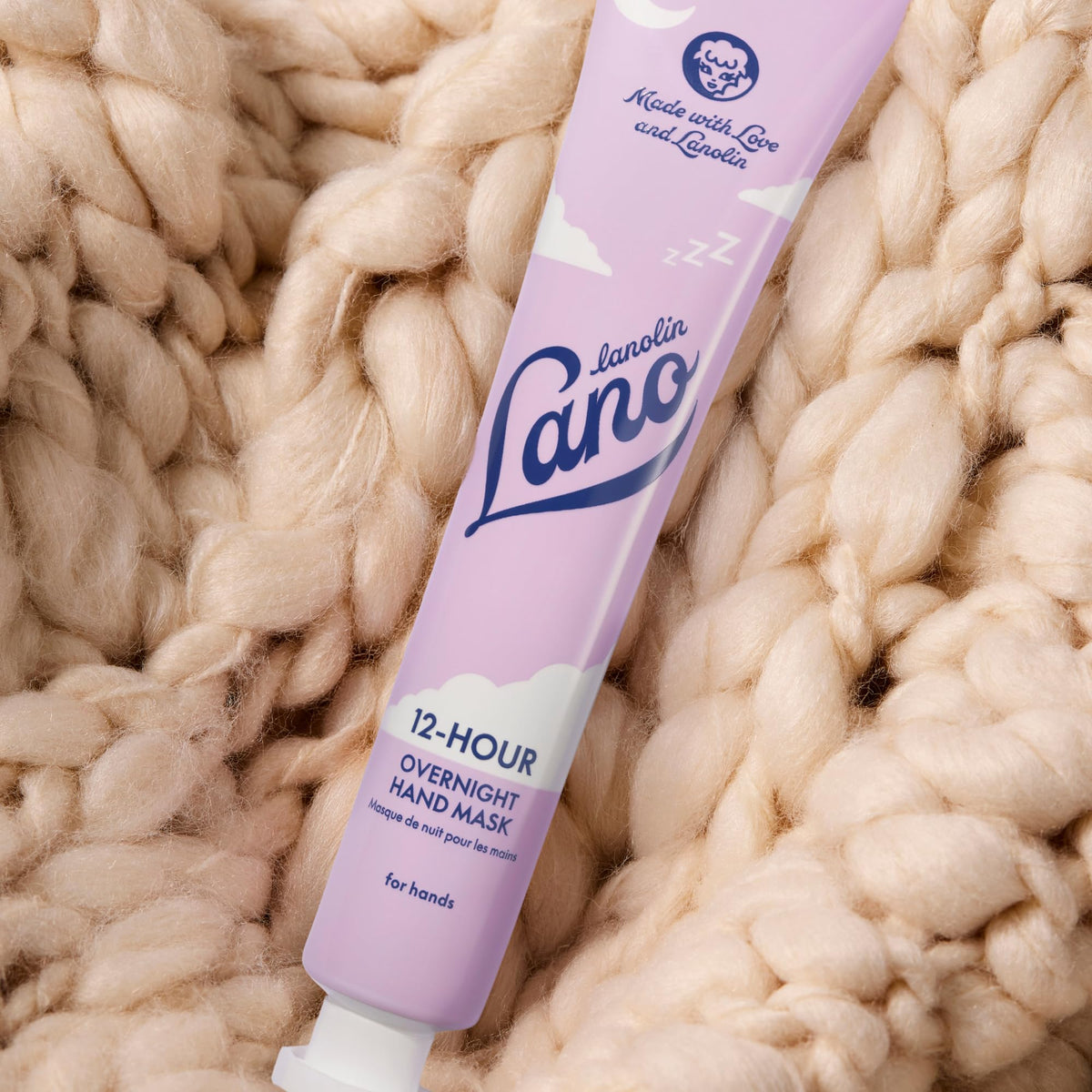 Lanolips hand mask in use at night on hands demonstrating restorative hydration
