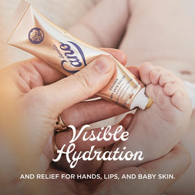 lanolips being smoothed onto hands to heal cracks and rough skin