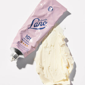 Lanolips ingredients display highlighting triple lanolin and nourishing oils