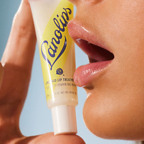 Lanolips Lemonaid applied on fingers demonstrating easy spreadability