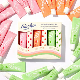 Lanolips peach tin close-up of labelled lid highlighting flavor and size