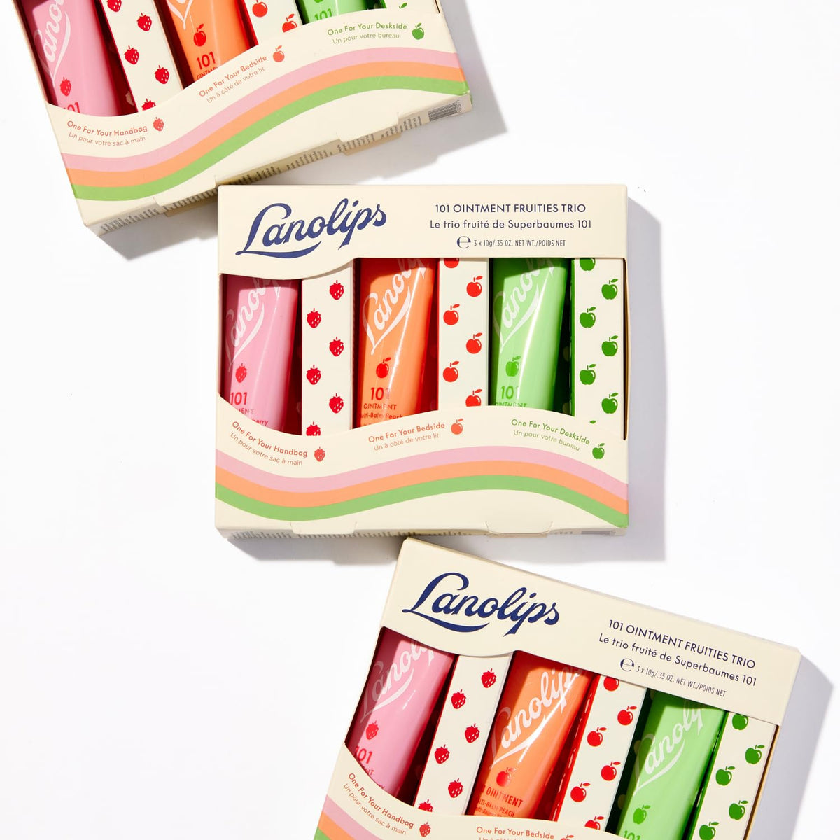 Lanolips strawberry tin open showing smooth ointment texture for hydration