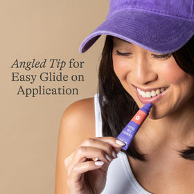 Lansinoh tube on bedside table illustrating night-time lip care routine