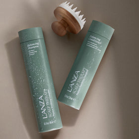 L’ANZA shampoo on bathroom shelf in a lifestyle scene suggesting daily routine comfort