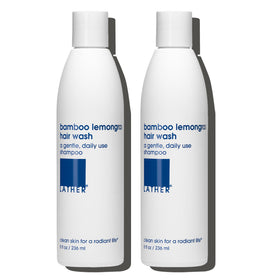 LATHER front packaging showing two bottles and lemongrass benefit
