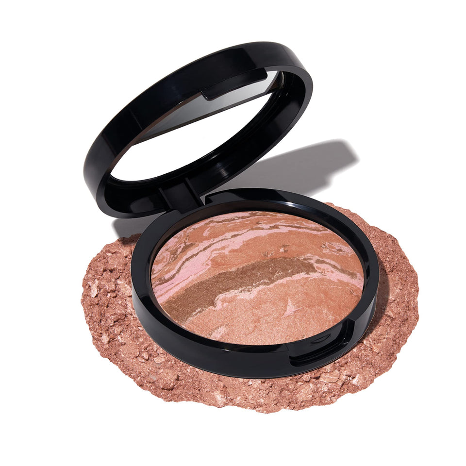 LAURA GELLER compact front view showing sleek packaging and immediate usability