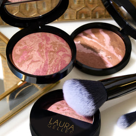 LAURA GELLER compact in hand comparing scale for travel-friendly portability