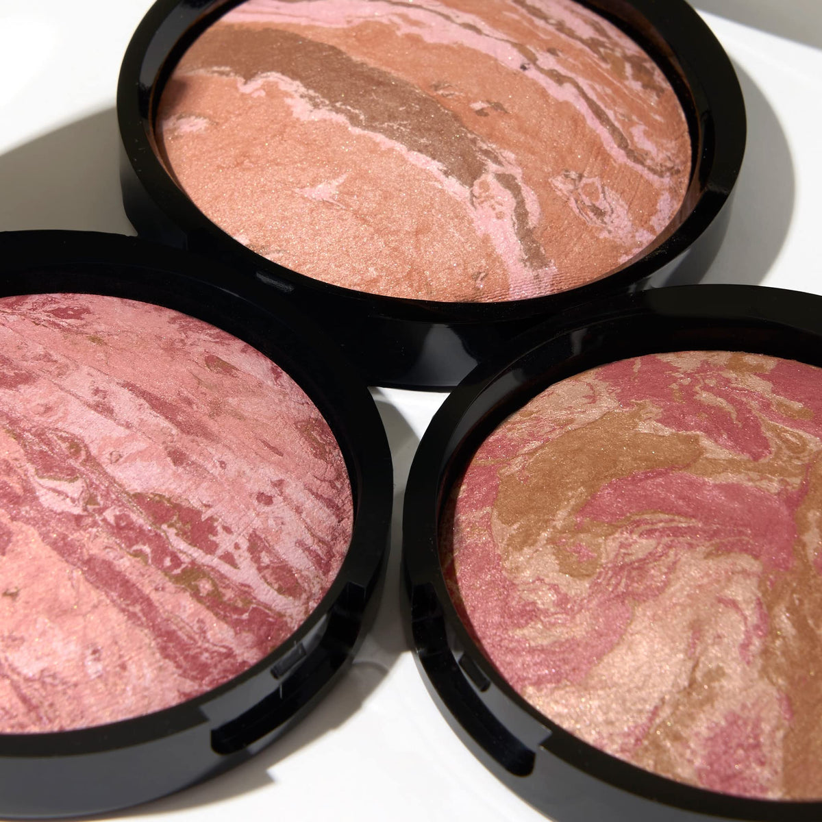 LAURA GELLER product inside a makeup bag styling shot for everyday routine inspiration