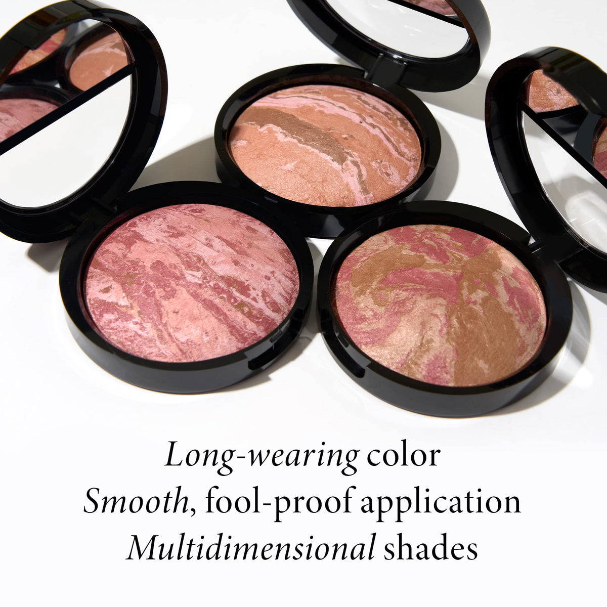 LAURA GELLER swirled powder texture close-up demonstrating blended color payoff