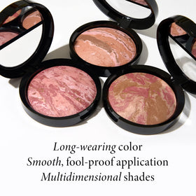 LAURA GELLER swirled powder texture close-up demonstrating blended color payoff