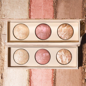 LAURA GELLER NEW YORK blending powders with brush to show smooth finish and easy application