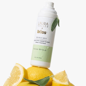 LAURA GELLER NEW YORK spray over finished makeup showing setting and glow benefit