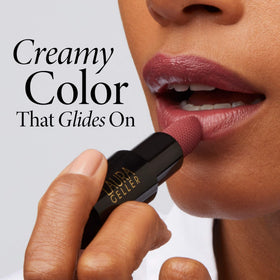 LAURA GELLER NEW YORK color swatch on arm showing Chocolate Raspberry payoff and true tone