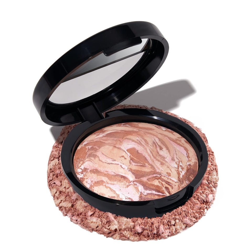 LAURA GELLER compact front showing product logo and sleek case, easy travel