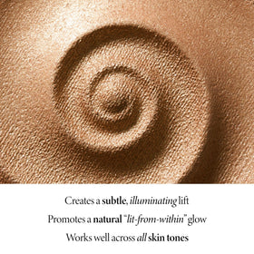 LAURA GELLER highlighter paired with bronzer to create warm sculpted dimension