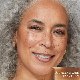 LAURA GELLER NEW YORK concealer in bag lifestyle shot for on-the-go refreshing benefit