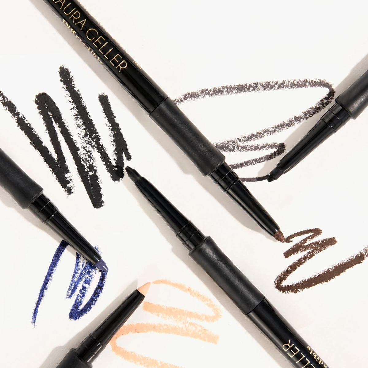 LAURA GELLER NEW YORK eyeliner next to makeup kit illustrating easy pairing and storage