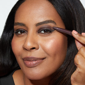 LAURA GELLER NEW YORK applied on eyelid as shadow achieving blended, sultry finish