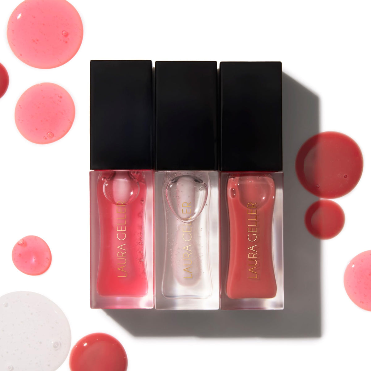 LAURA GELLER NEW YORK lip oil in a handbag for on-the-go hydration
