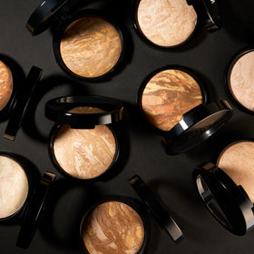 LAURA GELLER NEW YORK kit inside a travel bag for on-the-go touch-ups