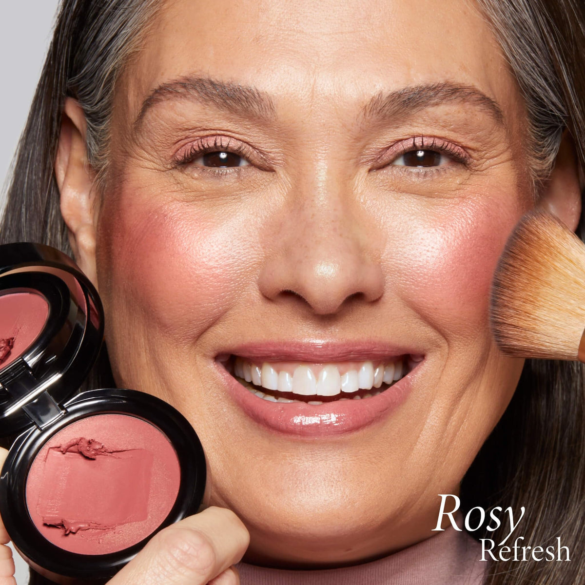 LAURA GELLER NEW YORK rosy refresh on lips in lifestyle shot for coordinated cheek‑lip tint