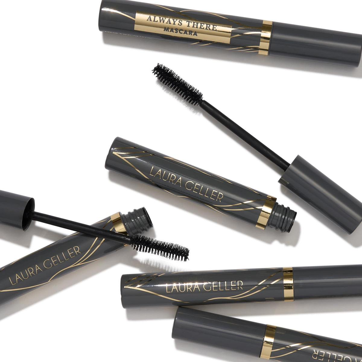 LAURA GELLER NEW YORK tube in hand illustrating compact travel-friendly size
