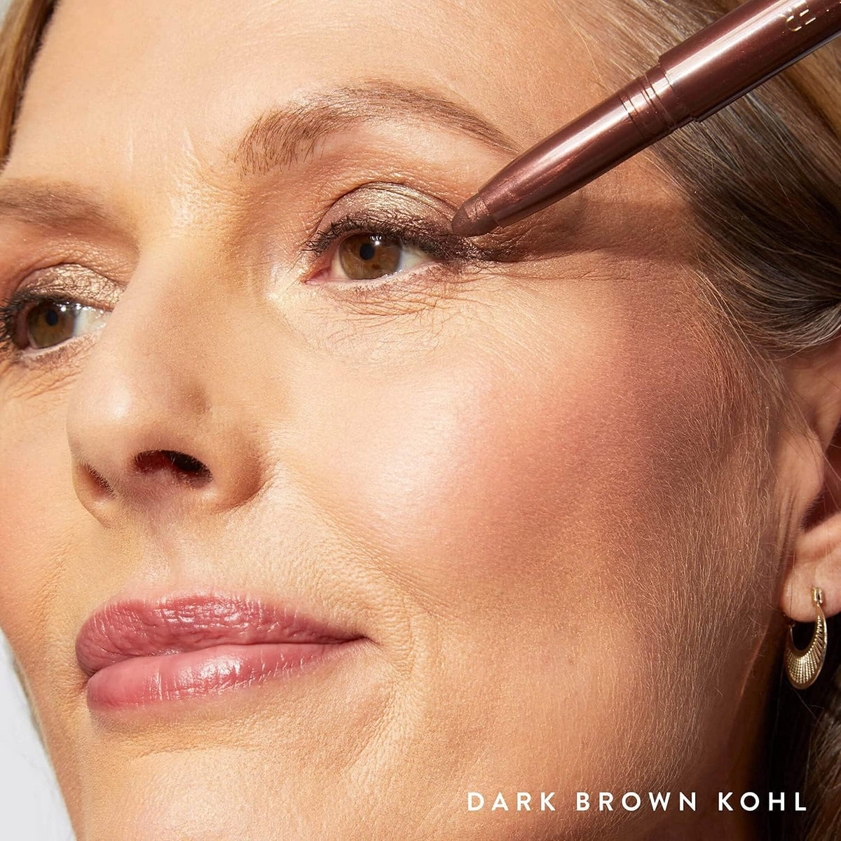 LAURA GELLER NEW YORK eyeliner blended on lid showing versatile shadow use