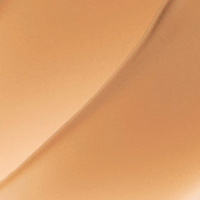 LAURA GELLER NEW YORK blended under-eye close-up showing natural radiant finish