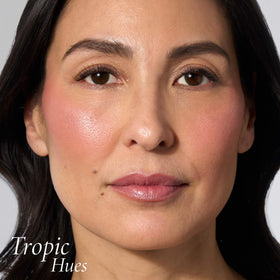 LAURA GELLER NEW YORK open compact displaying full baked powder for easy application