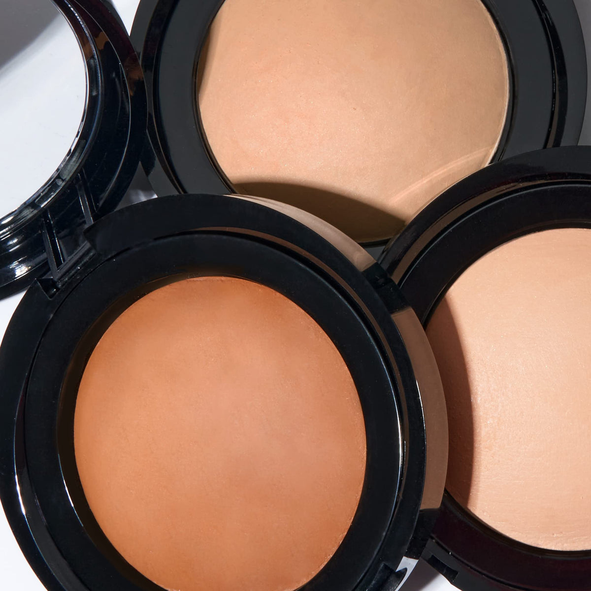 LAURA GELLER NEW YORK compact on vanity styled scene for everyday routine benefit