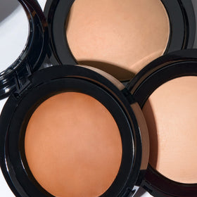 LAURA GELLER NEW YORK compact on vanity styled scene for everyday routine benefit