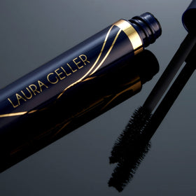 LAURA GELLER NEW YORK packaging label close-up highlights waterproof and smudge-proof benefits