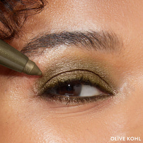 LAURA GELLER NEW YORK swatch on arm showing rich olive payoff