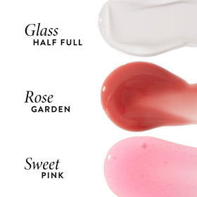 LAURA GELLER NEW YORK gloss worn on lips delivering hydrated, shiny finish